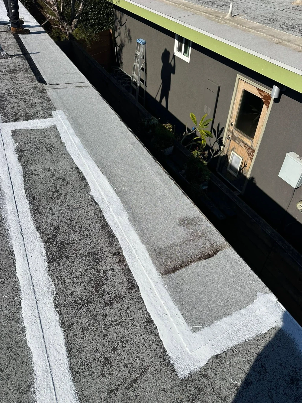Close-up of a flat roof asphalt surface texture